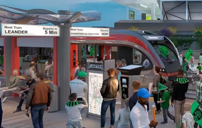 rendering of red light rail tran at crowded station platform
