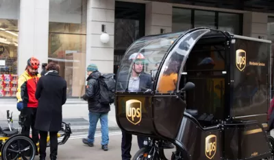 UPS delivery cargo bike with covered front seat in New York City
