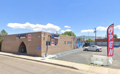 Google street view of bookstore in brick building in Albuquerque, New Mexico.