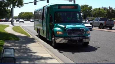 Teal mini-bus in CLovis, California.