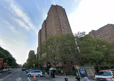 Tall brick public housing project in Bronx, New York City.