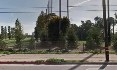 Barbed wire fence in front of golf course in Brentwood, Los Angeles, CA.