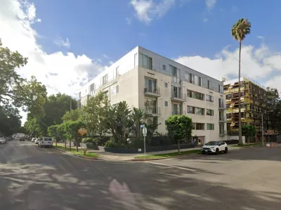 Google Maps street view of intersection and mid-rise apartment building in Westwood, Los Angeles, California.