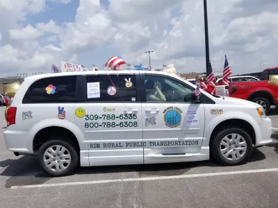 White microtransit van in Rock Island County, Illinois.