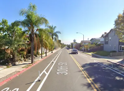 Google street view of protected bike lane on street in San Diego, California.