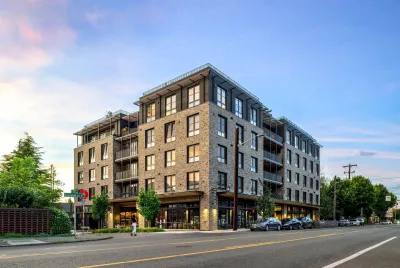 Co-housing building in Seattle, Washington with retail on ground floor.