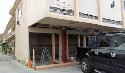 2-story Los Angeles dingbat apartment building getting soft-story seismic retrofit for earthquake safety