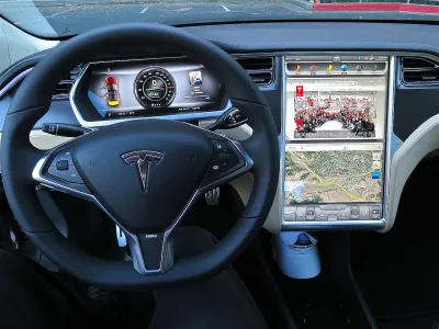 Tesla Model S dashboard with digital panels.