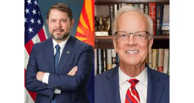 Two white men pose for official portraits