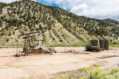 An oil well in a mountainous and remote part of Utah.