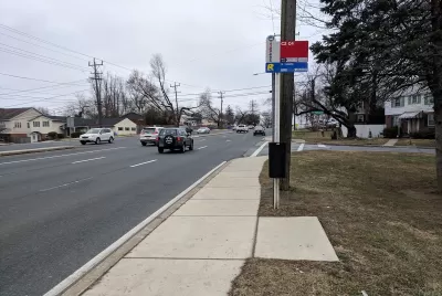 WMATA bus stop with sign and no bench or shelter in Washington, D.C.
