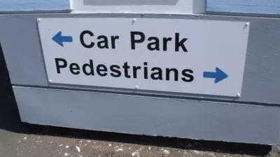 A sign for pedestrians and cars