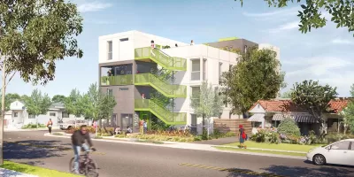 Rendering of three-story shipping container modular building for affordable housing in Watts, Los Angeles.