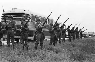 National Guard members protecting the bus for the Freedom Riders leaving Montgomery, Alabama, for Jackson, Mississippi.