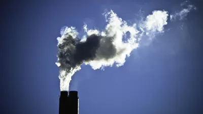 Smokestack with billowing smoke