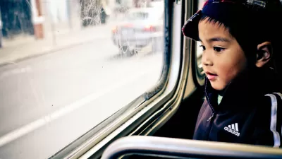 Kid on Bus