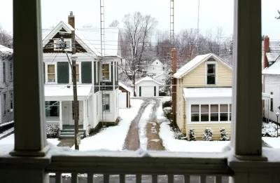 Wooden houses covered with snow