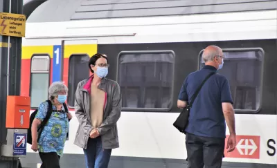 Masked Passengers at Rainway Station