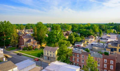 Aerial view of suburban houses and sunset sky - West Chester, Pennsylvania.