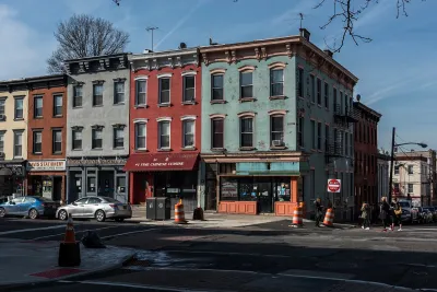 Colorful brick three-story apartment buildings in Hoboken, New Jersey.