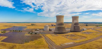 Rancho Seco Nuclear Power Plant cooling towers above solar panels plant.