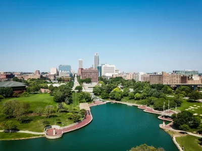 Aerial view of downtown Omaha, Nebraska with lake in foreground