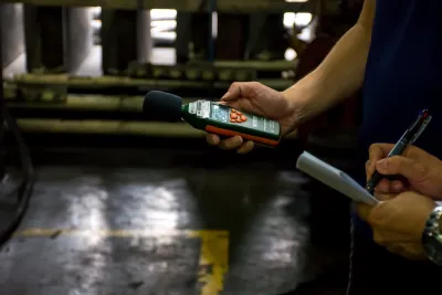 Engineers use sound level meter to measure sound level of generator and recording data.