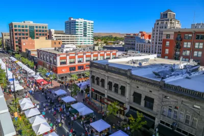Aerial view of farmers' market with white booths in downtown Boise, Idaho