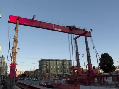 Construction crane and equipment on 4th Street for Central Subway project in San Francisco, California