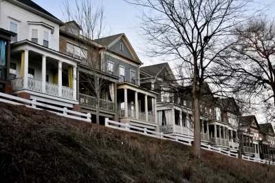 Wooden rowhouses with white fences in Atlanta, Georgia