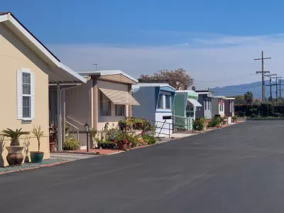 Row of manufactured homes on an asphalt street