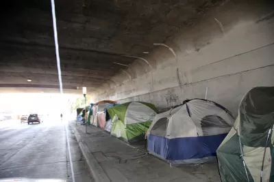 Tents lining an underpass in Los Angeles, California