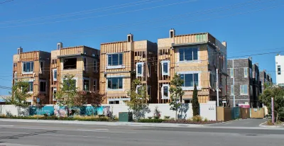 Three-story apartment buildings under construction in Costa Mesa, California.