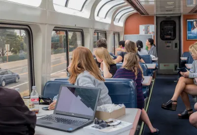 The interior of the viewing cart on the Amtrak train, where passengers gaze at the passing scenery.