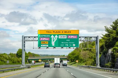Green freeway toll sign.