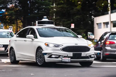 White Lyft self-driving car on San Francisco street.