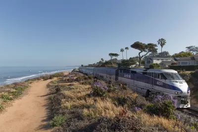 Amtrak train on track by the beach in Souhern California