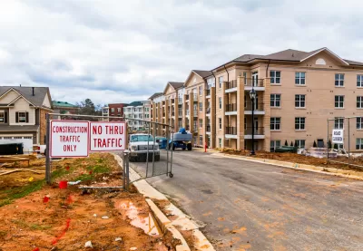 Construction site with 4-story apartment buildings in progress