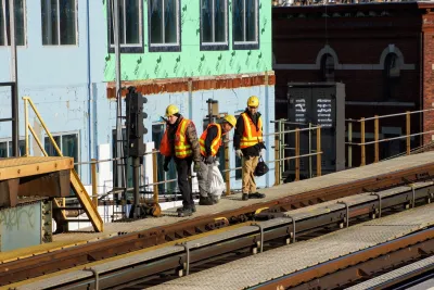 NYC MTA Subway Track Inspectors Working on an Elevated Platform Track.