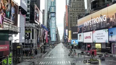 Empty New York City street during the COVID-19 pandemic with #NYSTRONG billboard in foreground.