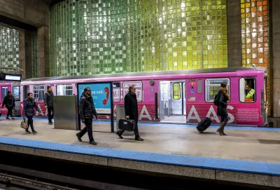 People walk off a train in chicago