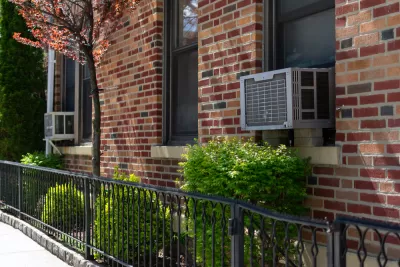 Window air conditioner units on a brick building