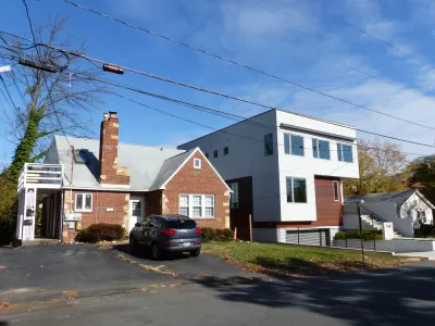 Traditional single-family home next to modern home in Arlington, Virginia