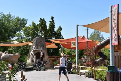 Colorful playground at zoo in Salt Lake City, Utah on sunny day.