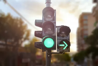 Traffic light with green light on and green right turn arrow on