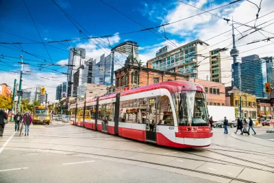 Red and white Toronto streetcar