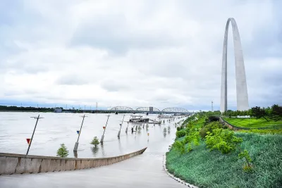 Flooded Mississippi River next to Gateway Arch in St. Louis, Missouri.