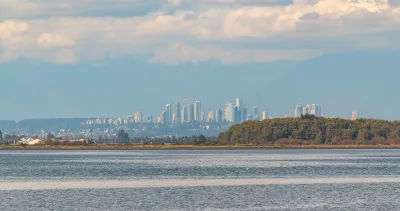Skyline of Richmond, British Columbia with water in the foreground.