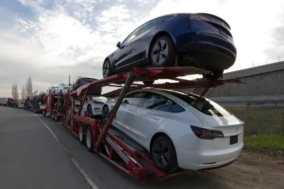 Electric vehicles loaded on a truck