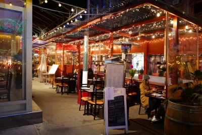 Italian restaurant outdoor dining patio with string lights in New York City